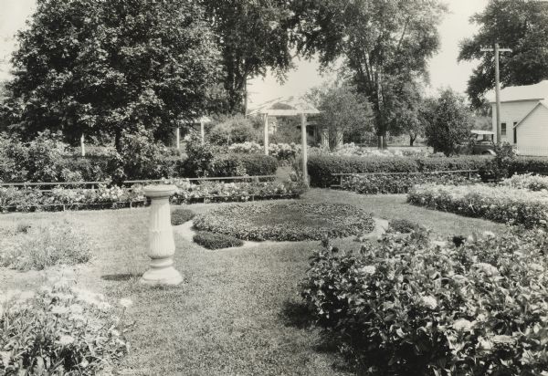 View of intricate home garden of L.B. Olmstead, demonstrating extensive planning and upkeep.