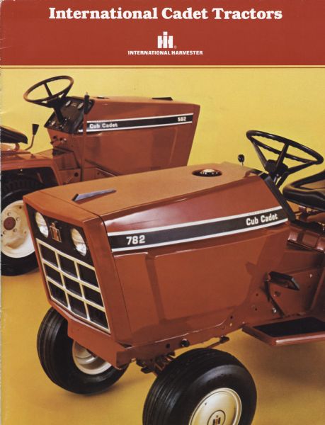 Front cover of an International advertising brochure for Cadet tractors.  Color photograph features two Cub Cadets parked side by side, models 582 and 782.