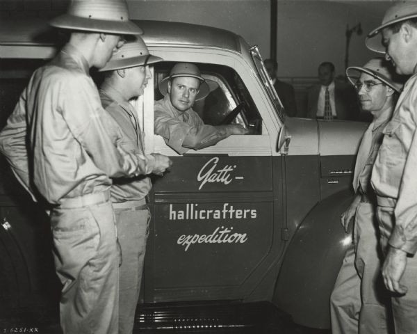 Original caption reads: "Shown in the above round-up are the members of the Gatti-Hallicrafters Expedition. They are left to right: John Powers, writer; Robert Leo, radio tech; Weldon King, second officer; E.C. Prince, photographer; and W.D. Snyder, radio tech."