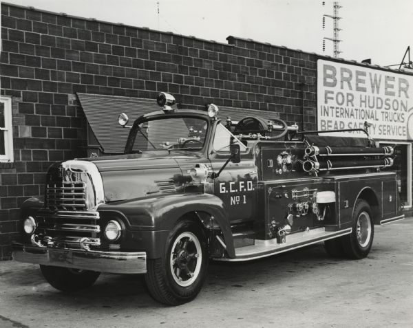 International fire truck used by the Granite City Fire Department. Original caption reads: 'R-1856 - 175" wheelbase. RD450 engine. 9.00x20-10 ply tires. 300 watt generator, equipped with fire apparatus, Freeburg, Ill.'