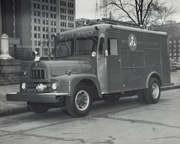 Original caption reads: "Model R-196, 157" wheelbase, 501 engine, Leece-Neville alternator with 110 volt transformer, 12 volt system, no-spin rear axle, 5-speed direct in 5th transmission, 9.00X20-10 ply tires, full air brakes NU7-16F front-mounted winch, rescue body Civil Defense Tools."
