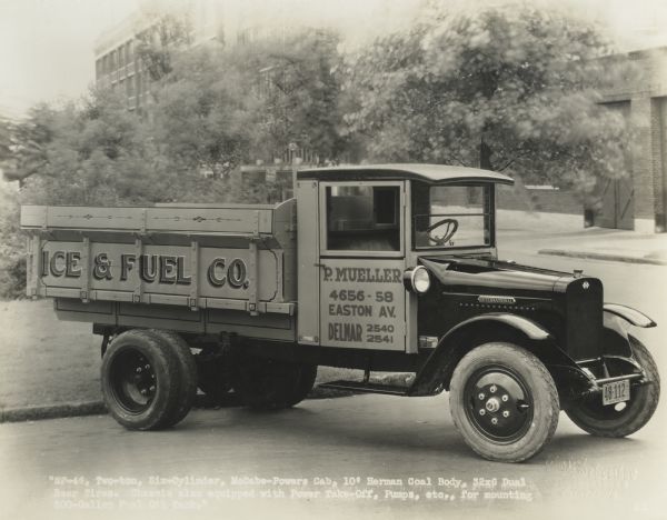 International SF-46 truck operated by P. Mueller for the Ice & Fuel Co. Original caption reads: "SF46, two ton, 6 cylinder, McCabe-Powers Cab, 10" Herman Coal body, 32x6 dual rear tires. Chassis equipped with power take-off, pumps etc., for mounting 800-gallon fuel oil tank."
