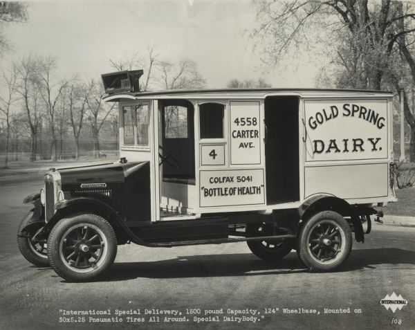 International Special Delivery truck owned by the Gold Spring Dairy. Original caption reads: "International Special Delivery, 1500 pound capacity, 124" wheelbase, mounted on 30x5.25 pneumatic tires all around, Special DairyBody."