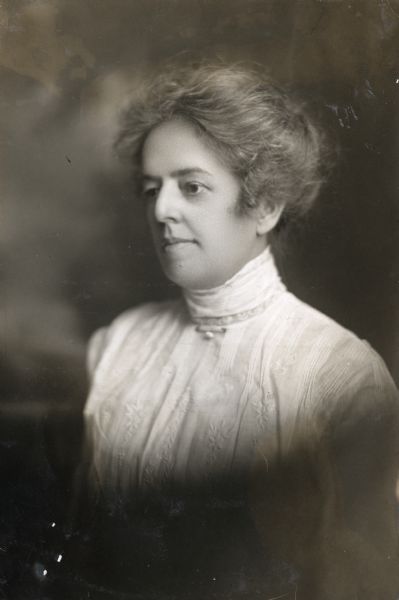 Quarter-length portrait of Miss Amanda Stoltzfus. In 1910, Stoltzfus organized the Tuleta Agriculture High School in Tuleta, Texas and later became an instructor at the University of Texas at Austin.