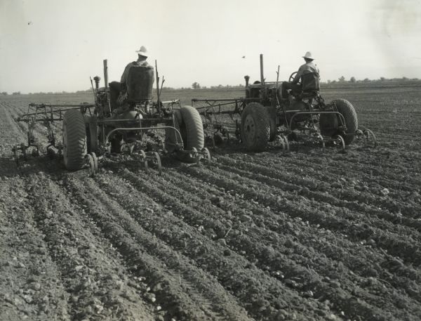 Two men operate Farmall F-30 tractors with harrow and cultivating attachments at "Hoover Ranches." The ranch was owned by ex-President Herbert Hoover. Original caption reads: "International Equipment for Hoover Ranches.