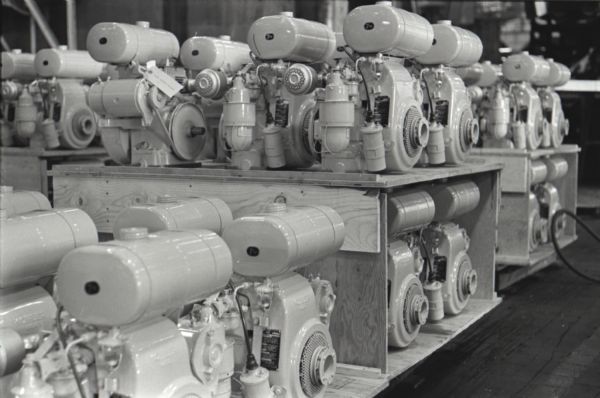 Rows of Cub Cadet lawn tractor engines lined up inside International Harvester's Louisville Works factory.