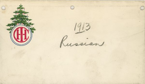 Envelope with the IHC logo and a tree decorated with candles. This envelope was intended for use with a Russian Christmas card.