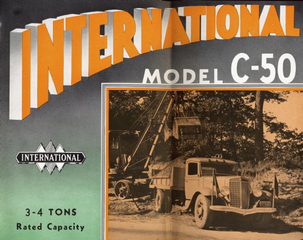 Cover of an advertising brochure for the International C-50 truck. Features a photograph of a shovel loading a C-50 dump truck with loose soil.