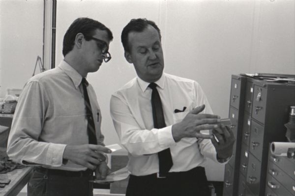 IH engineer Ted Ornas and a student discuss the building of a "Multipurpose Safety Utility Vehicle" during International Harvester's first styling seminar at the Fort Wayne motor truck engineering department. The program lasted ten weeks and participants were college students in their junior year.