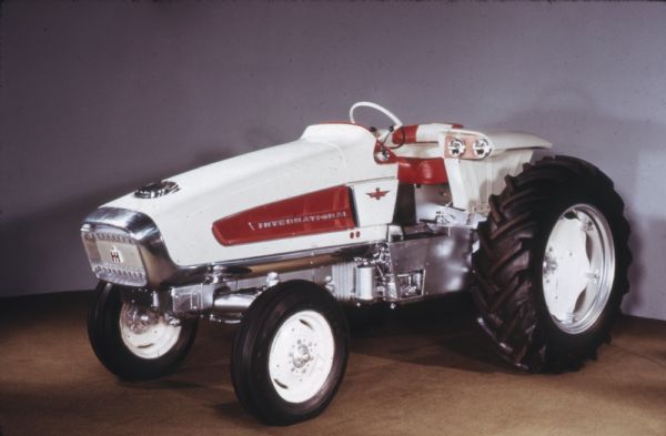Color studio photograph of Model HT-340, an International Harvester turbine power hydrostatic transmission experimental tractor.