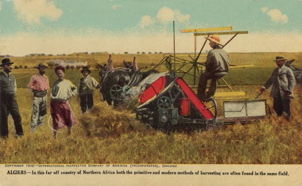 Postcard of a harvesting scene in Algiers. Includes a color illustration of a horse-drawn grain binder. Caption reads: "Algiers — In this far off country of Northern Africa both the primitive and modern methods of harvesting are often found in the same field."