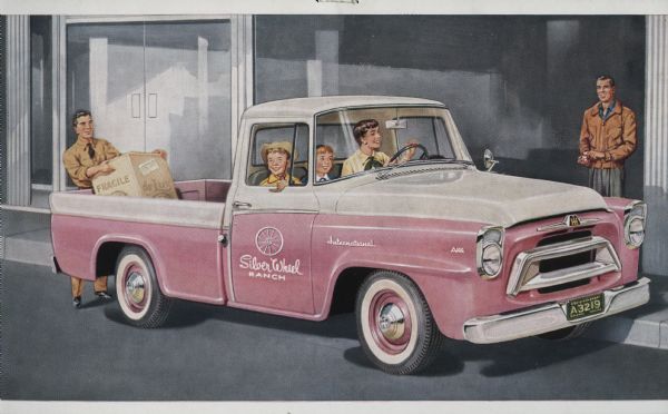 Advertising postcard featuring a color illustration of a woman and children in the cab of an International A-100 pickup truck with the text: "Silver Wheel Ranch" on the side. A man stands by as another handles a box in the bed of the truck.