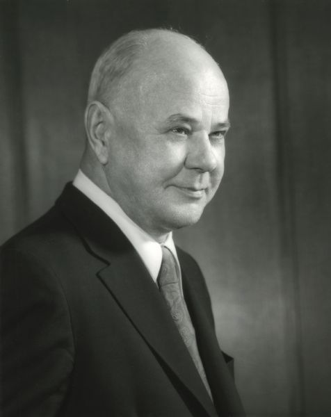 Quarter-length portrait of Roger J. Crise. Crise was born in Letts, Indiana on September 15, 1913. He served as Corporate Accounting Administrator at the International Harvester Company from 1958 to 1961, when he was promoted to manager of Corporate Accounting. Crise was appointed Assistant Comptroller in March of 1963 and elected Comptroller on April 21, 1966. He was made Vice President and Comptroller in 1973.