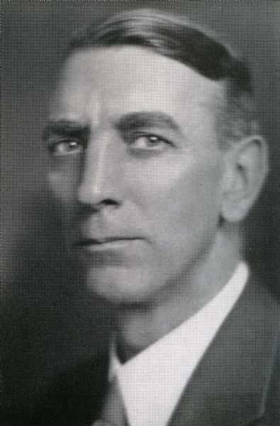 Head and shoulders portrait of William P. Kelly. Kelly worked at the International Harvester Company for 20 years, with part of that time spent in the office of Comptroller.