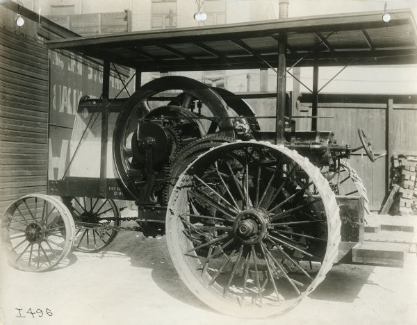 Three-quarter view from left side of a tractor with a 20-horsepower engine.