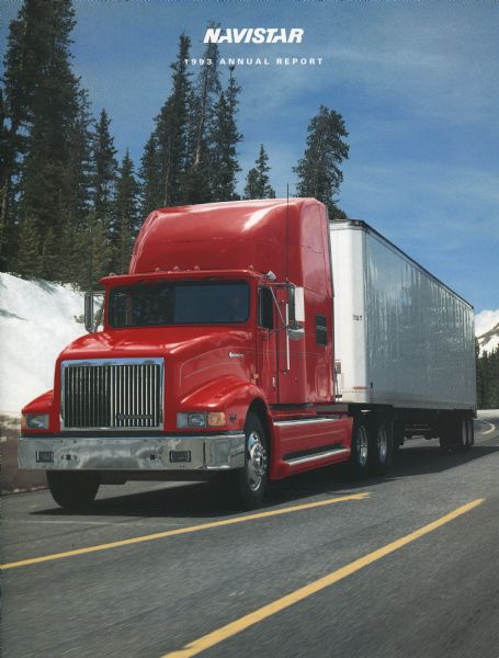 Front cover to Navistar's annual report, featuring a color photograph of a 9400 model heavy-duty truck driving through a snow-covered terrain.