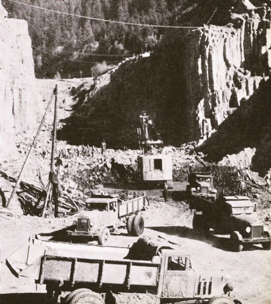 International trucks perform heavy-duty jobs on the construction site of the Bonneville Dam.