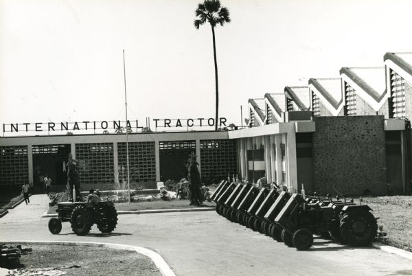 Tractors lined up outside the factory of the International Tractor Company of India, in the Kandivli industrial area outside Bombay. The factory was part of a joint venture between the International Harvester Company, Mahindra & Mahindra, and Voltas Limited.
