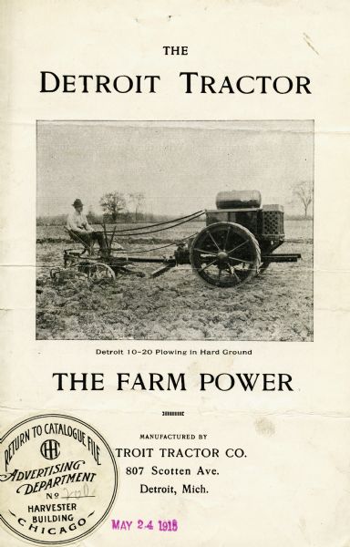 Front cover of a pamphlet advertising the Detroit Tractor featuring a photograph of the Detroit 10-20 "plowing in hard ground."
