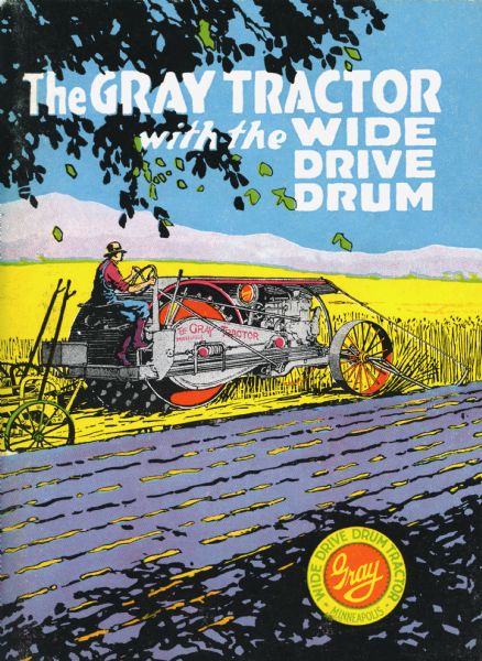 Front cover of a pamphlet advertising the Gray tractor "with the Wide Drive Drum." The color illustration depicts a man using the tractor to work in a field in front of a mountain range.
