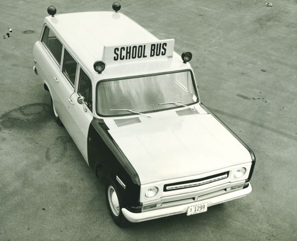 Elevated front view of an International Travelall 1100 school bus.
