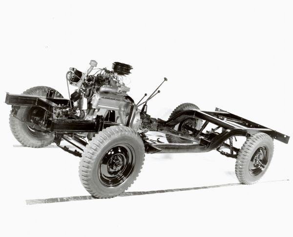 Production shot of a 1961 International Scout chassis featuring a view of the driver's side.