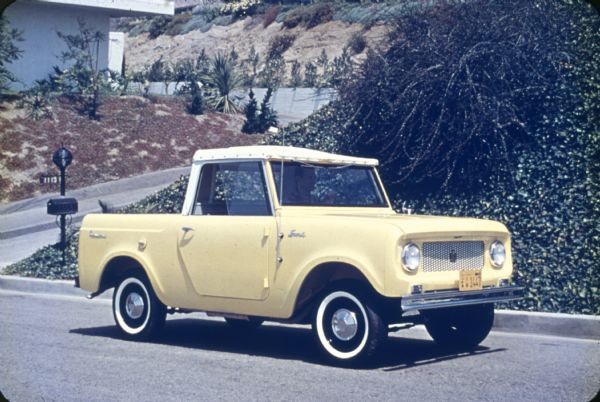 Man Driving Yellow Scout with White Top | Photograph | Wisconsin ...