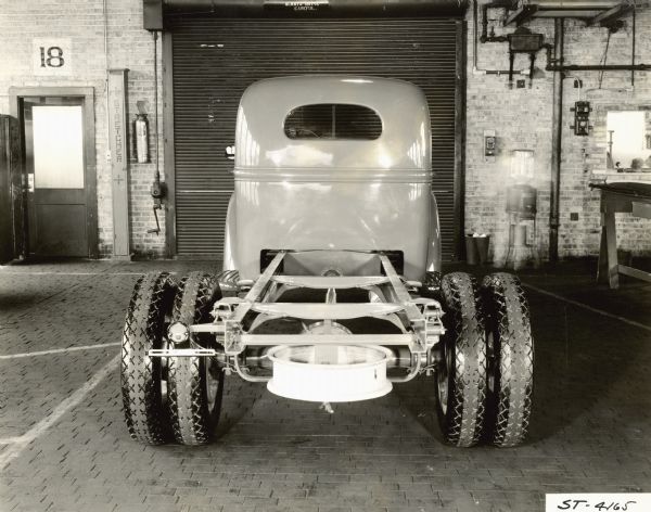 Rear view of International Harvester model truck chassis and cab. Possibly a Raymond Loewy design.