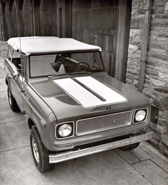 Original caption: "The SR-2 Scout from International trucks. Shown for the first time in an advance model at the Chicago Auto Show, February 21- March 1 1970, this limited-production version of the popular four-wheel drive Scout features the V-304 V8 engine, developing 193 horsepower at 4400 rpm, 262 foot-pounds of net torque at 2500 rpm. Equipped with the T-39 console-shit 3 speed automatic transmission and a single-lever transfer case with high and low four-wheel-drive ranges as well as two-wheel high, the SR-2 offers excellent on and off-road performance features. The SR-2 will become available in the Spring, International Harvester Company officials said. Photo #w-6323 MT-3411 2//70".