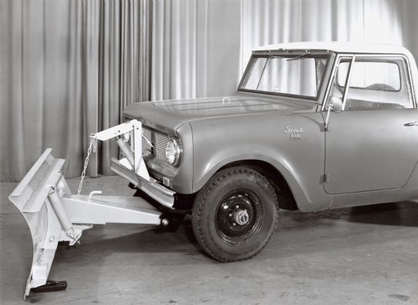 International Scout pictured on display with plow attachment.