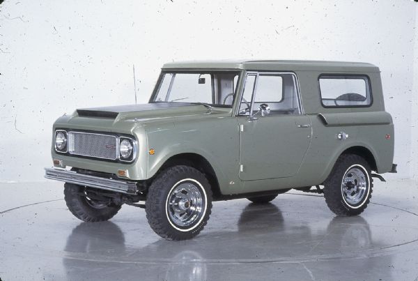 Driver's side view of green International Scout Aristocrat.