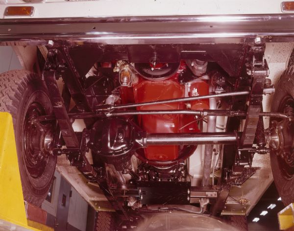 Scout 4x4 engine, as seen from below. The Scout is mounted on a raised lift.