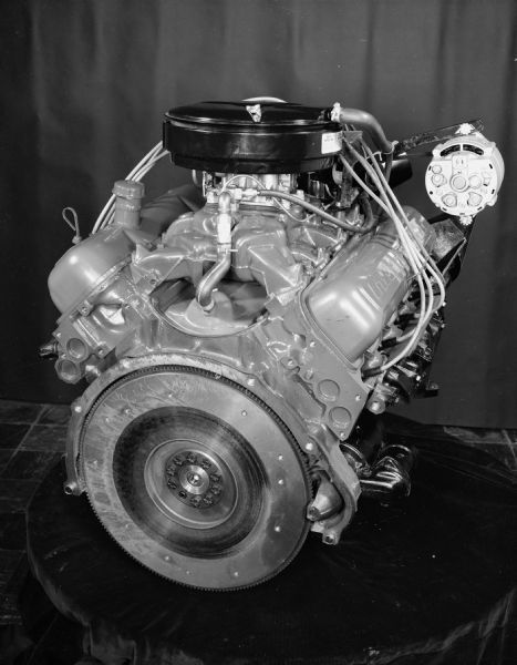 Scout engine displayed on a table draped with fabric.