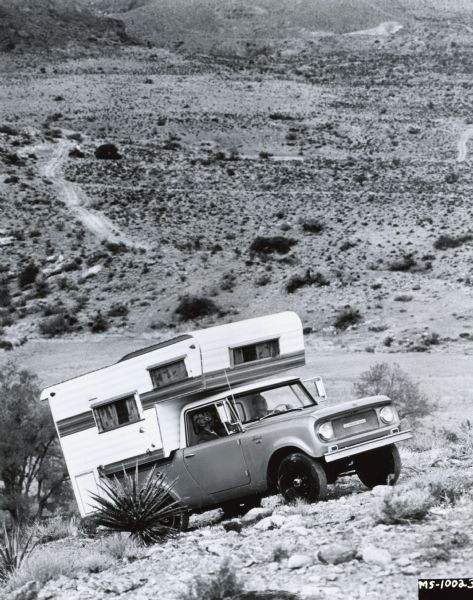 Original caption reads: "The all-wheel drive Scout by International, shown here with camper insert, proves a rugged and maneuverable unit for the outdoorsman who wants a camper to get to those 'special' out-of-the-way locations. Wheelbase is a snug 100-in. A 93-hp. 4-cyl. Comanche engine provides power. 2/3/66."