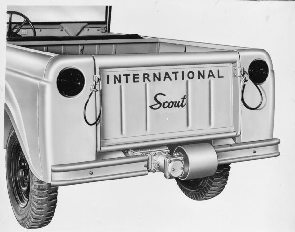 Three-quarter view of tailgate of Scout 4x4. Image appears to be retouched.