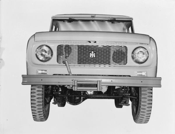 Front of Scout 4x4. Winch is attached to bumper. Image appears to be retouched.