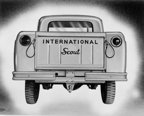 Rear view of tailgate of Scout 4x4. Image appears to be retouched.