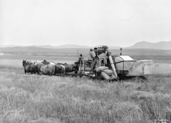 Original caption reads: "Argentine wheat harvesting scene showing the McCormick No. 4 harvester-thresher during the season of 1925-1926"