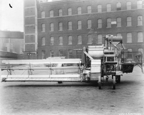 Original caption reads: "McCormick No. 10 harvester-thresher equipped with 16-foot solid platform. This machine has been the accepted heavy type machine sold by Ager, Cross and Company in the Argentine and by other McCormick dealers elsewhere abroad since 1927."