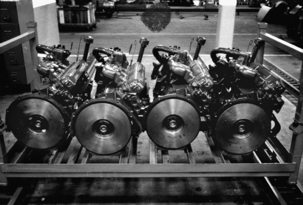 Four International Scout engines prepped for installation. Assembly line image from International Harvester's Fort Wayne plant, subject of a 1961 article in <i>International Harvester Today</i> entitled: "The Scout."