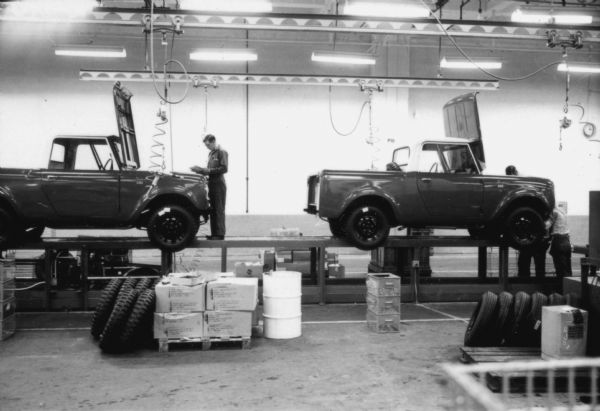 Men working on production line on International Scouts. Assembly line image from International Harvester's Fort Wayne plant, subject of a 1961 article in <i>International Harvester Today</i> entitled: "The Scout."