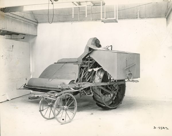 Three-quarter front view of stripper-harvester.