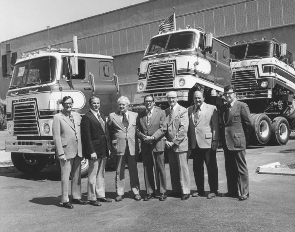 Group of Men Posing with COF 4070A Transtars | Photograph
