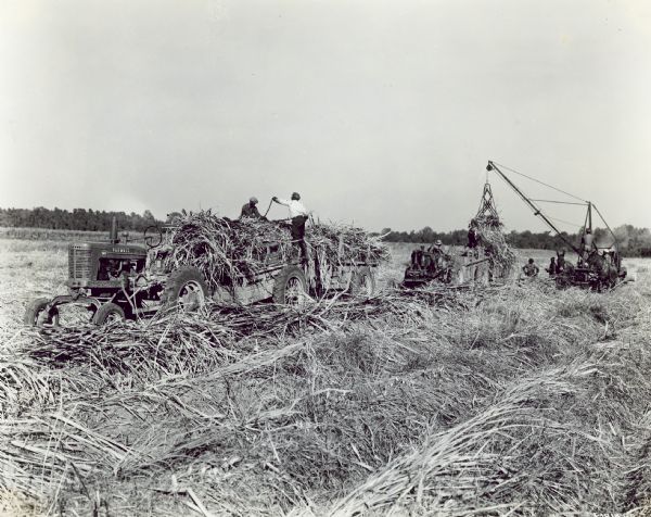 The caption states the "Farmall MV shown is owned by C.R. Tschirn of Donaldsville, Louisiana, who operates a 350-acre farm, 225 acres of which were in sugar cane."