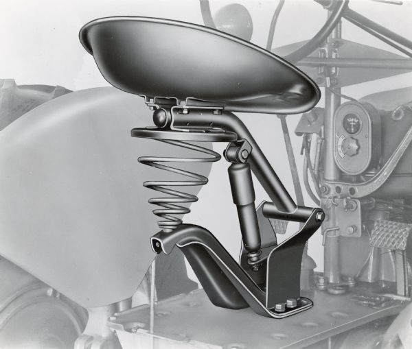 Illustration of a standard shock-absorbing seat for Farmall H, M, & MD tractors.