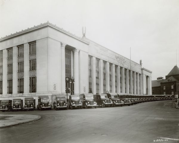 View across street towards a fleet of Internationals delivered in the spring to Post Office Department.