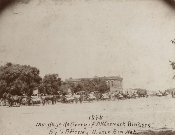 Original caption reads: "1898 One days delivery of McCormack [McCormick] Binders By O.P. Perley Broken Bow Neb."  