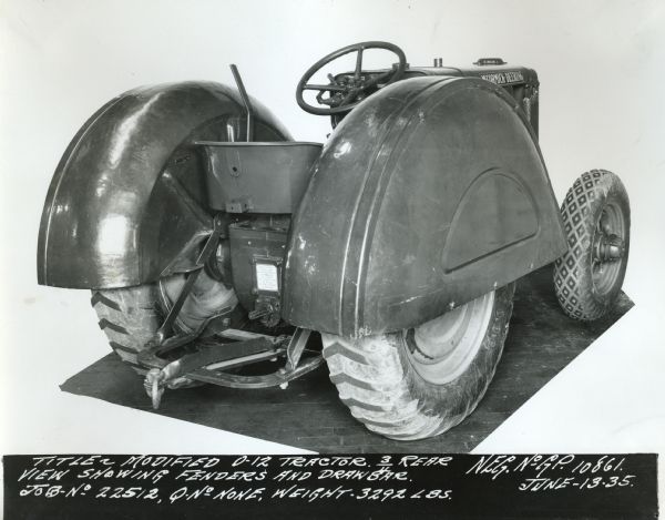 Original caption reads: "Title: modified O-12 tractor 3/4 rear view showing fenders and drawbar. Job No: 22512, Q-no: None, Weight-3292 lbs. Neg. No. G.P. 10861 June 13-35."