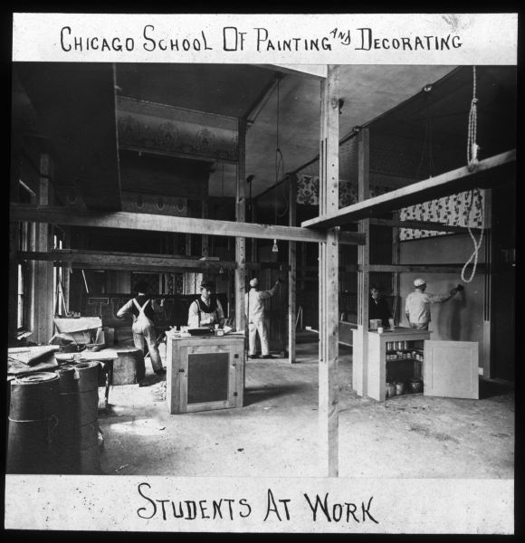 Students are working at the Chicago School of Painting and Decorating. Lantern slide.