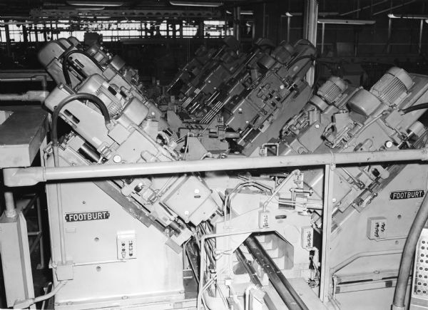 Caption reads: "Footburt Reaming Machine for Motor Truck V8 Engine Cylinder Blocks."